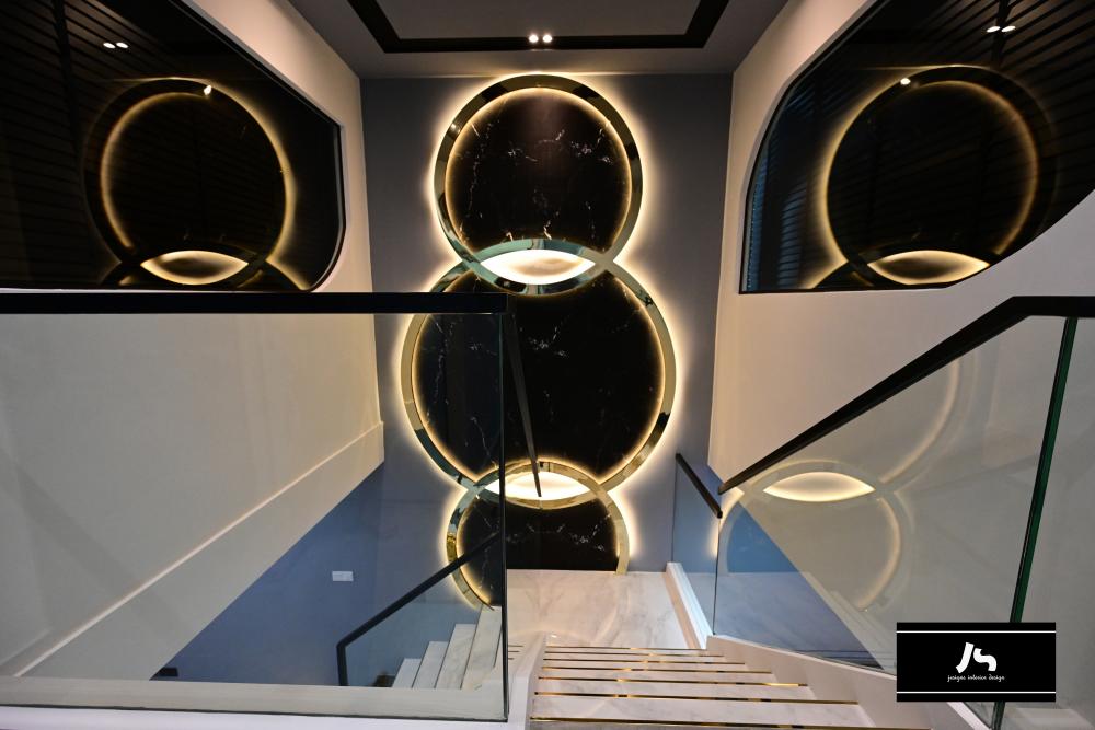 Modern Hallway with Staircase and Cove Lighting