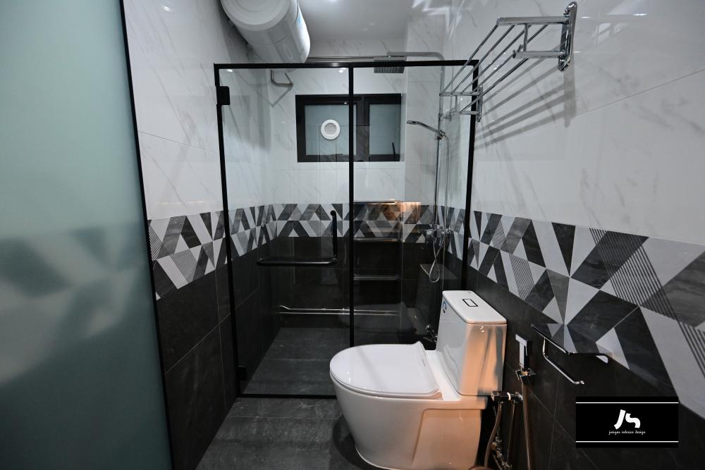 Modern Bathroom with Homogeneous Tiles and Herringbone Tiling