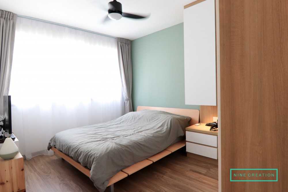 Scandinavian Bedroom with Wood Flooring and Wardrobe