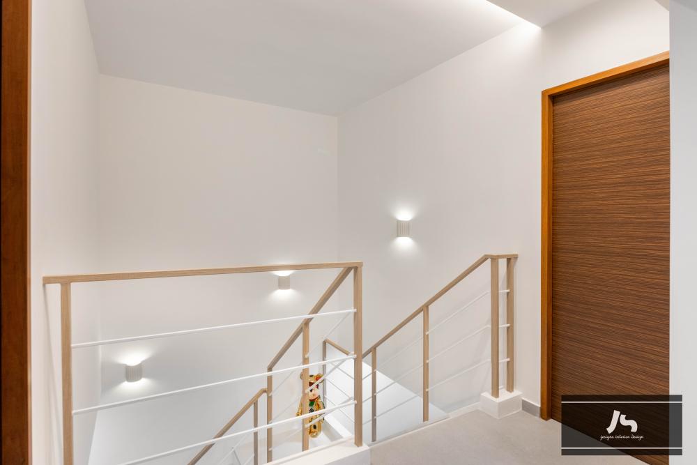 Minimalist Hallway with Staircase and Ceiling Light