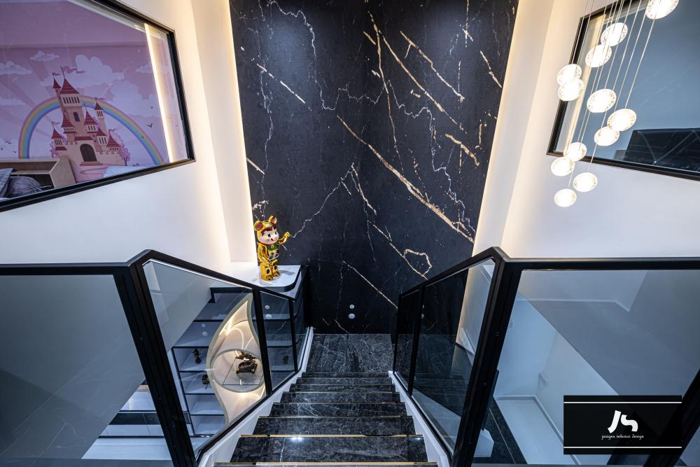 Modern Foyer with Staircase and Artwork