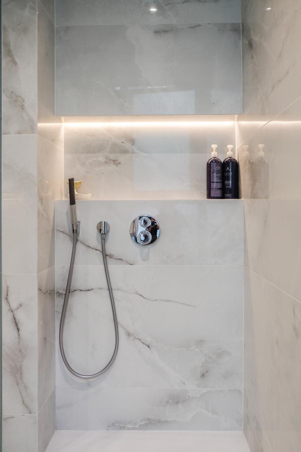 Modern Bathroom with Showers and Lighting