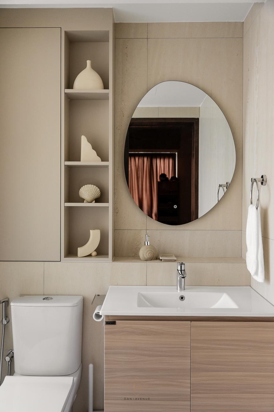 Scandinavian Bathroom with Homogeneous Tiles and Mirror