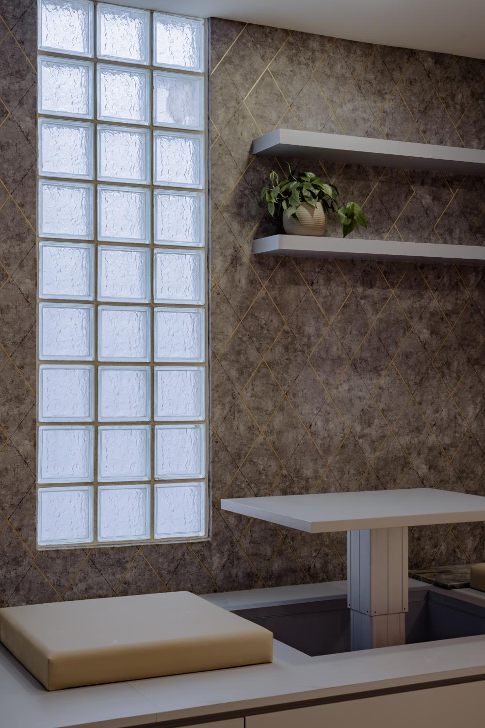 Modern Hallway with Bookshelf and Artwork