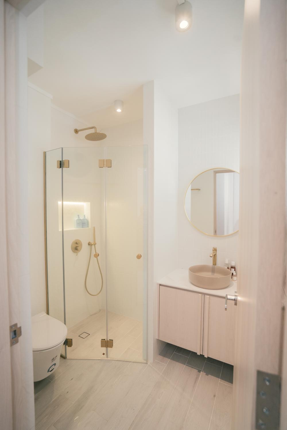 Modern Bathroom with Vanity Counter and Shower Screen