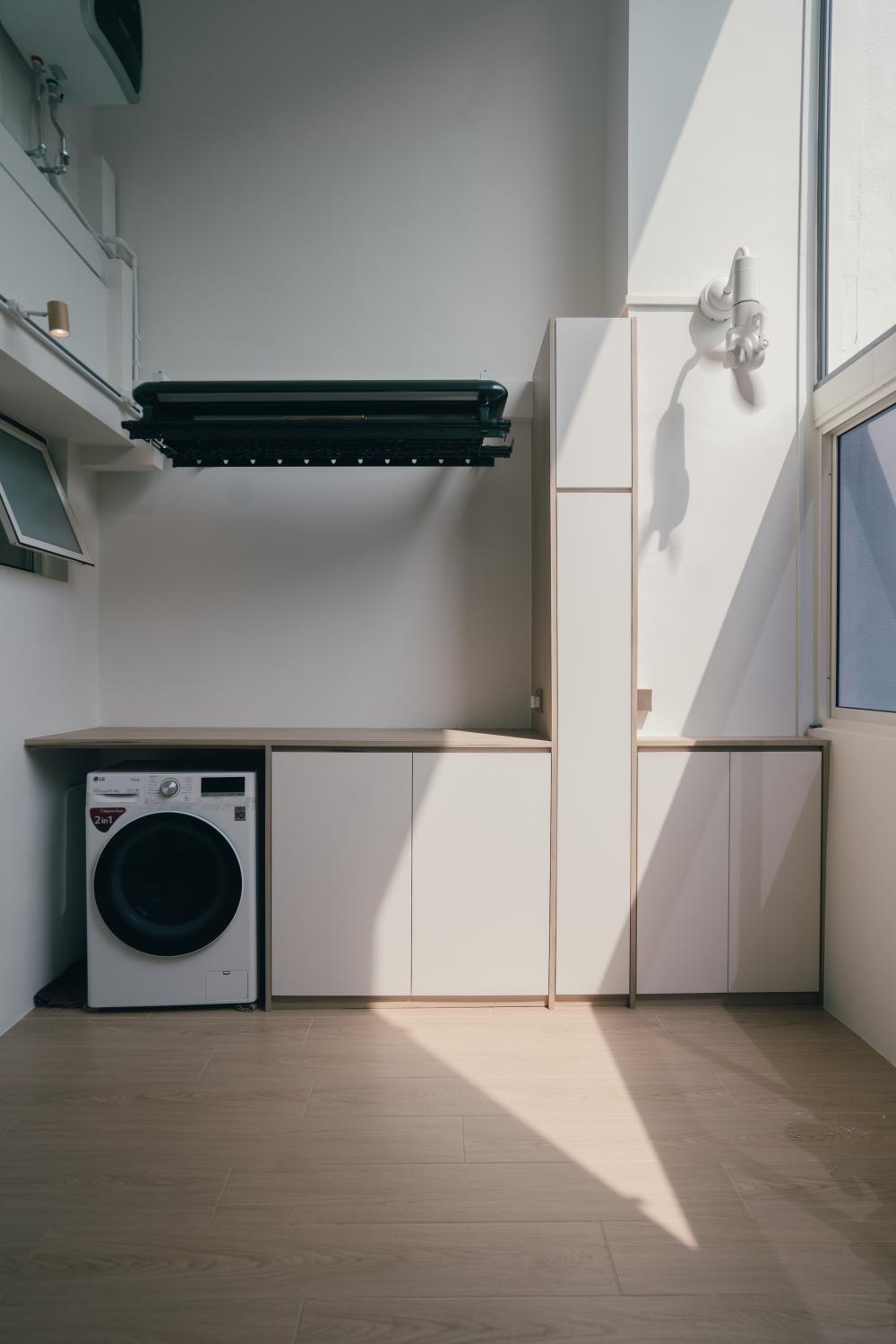 Modern Service Yard with Laundry Area and Drying Racks