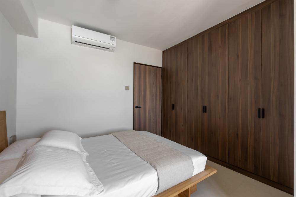 Modern Bedroom with Homogeneous Tiles and Wardrobe