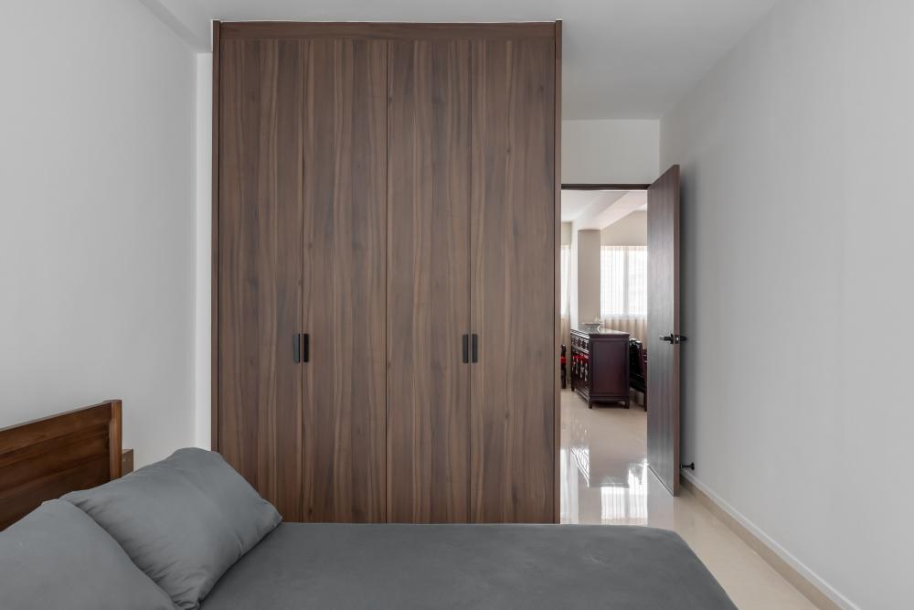 Modern Bedroom with Homogeneous Tiles and Wardrobe