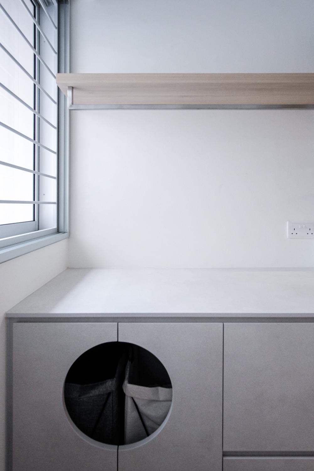 Minimalist Service Yard with Laundry Area and Window Grille