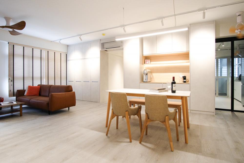 Minimalist Dining Room with Vinyl Flooring and Drop Light