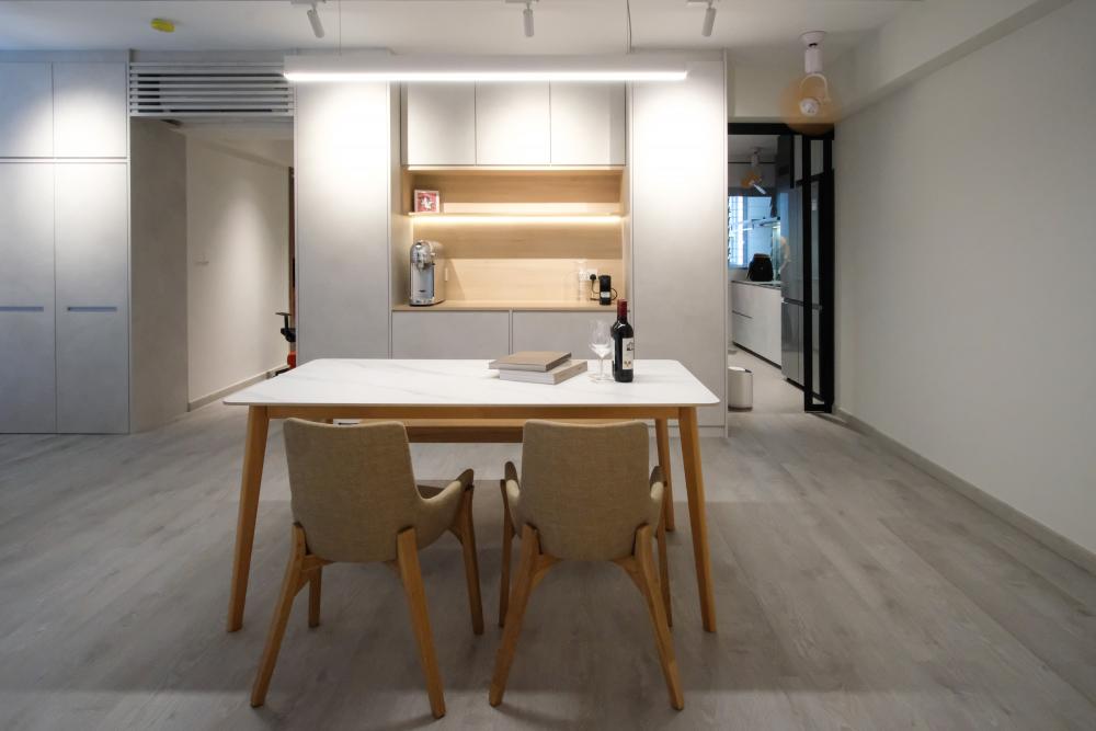 Minimalist Dining Room with Vinyl Flooring and Drop Light