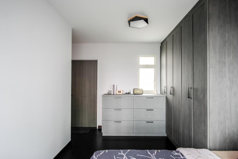 Industrial Bedroom with Ceiling Light and Drawer Units