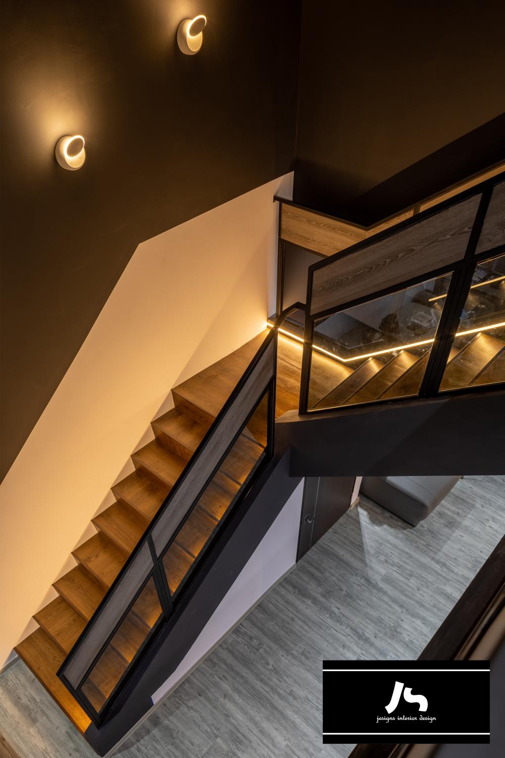Eclectic Hallway with Drop Light and Staircase