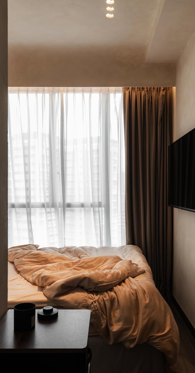 Minimalist Bedroom with Bay Window and Wardrobe