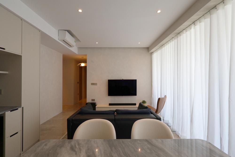 Minimalist Living Room with Sofa and Ottoman