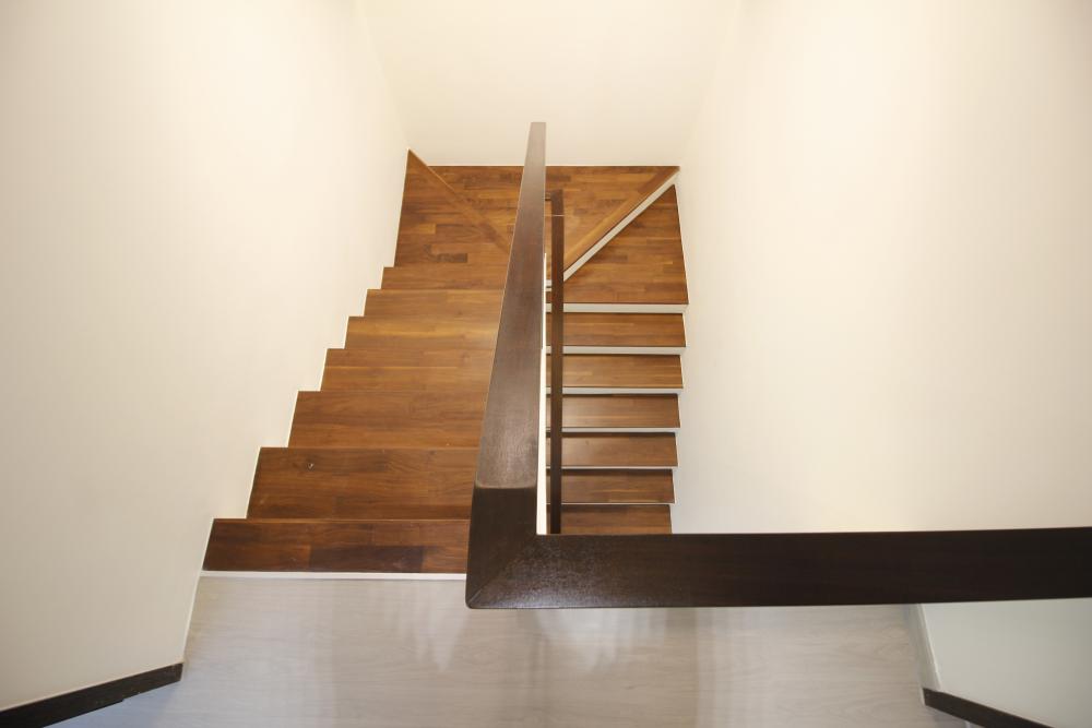 Modern Hallway with Vinyl Flooring and Staircase