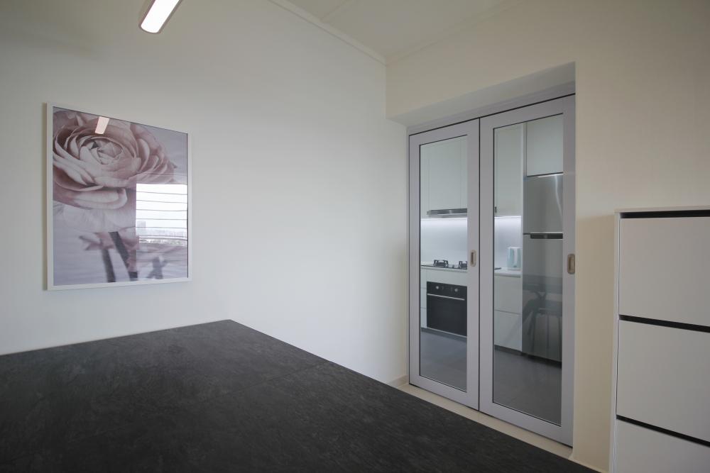 Contemporary Hallway with Bookshelf and Artwork