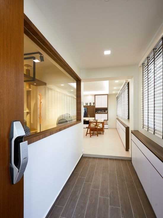 Contemporary Foyer with Artwork and Console Table