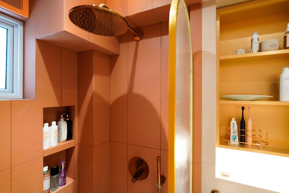 Scandinavian Bathroom with Homogeneous Tiles and Bathroom Storage