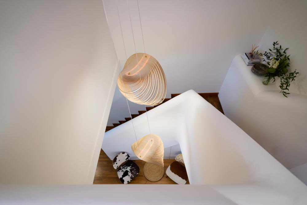 Scandinavian Entryway with Staircase and Lighting