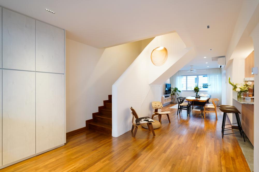 Scandinavian Entryway with Staircase and Seating Bench