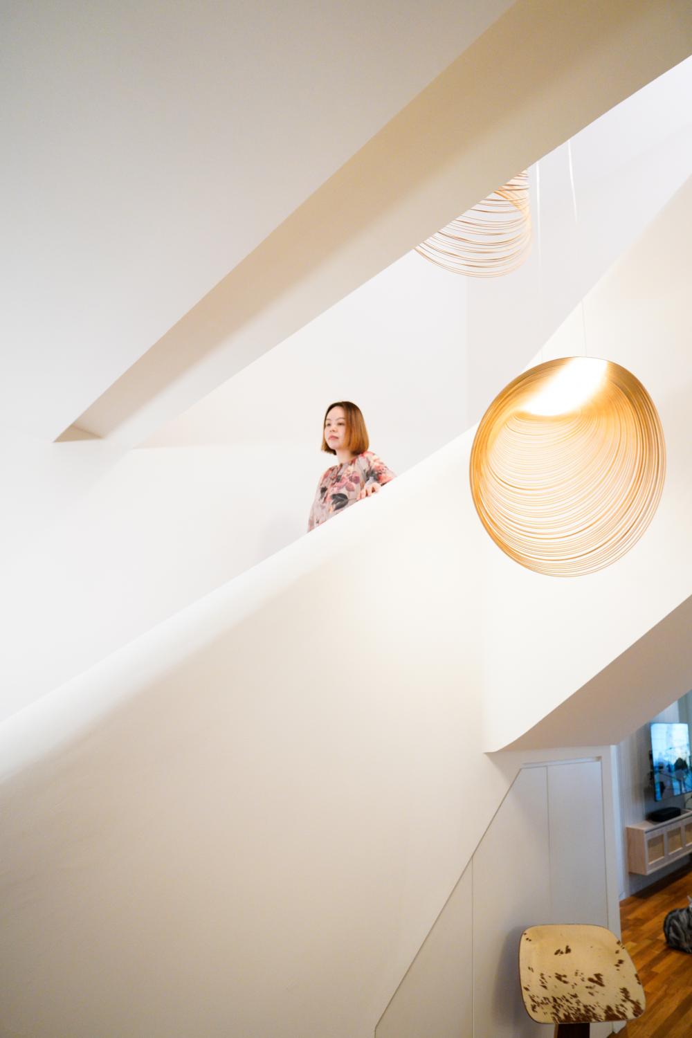 Scandinavian Entryway with Staircase and Seating Bench