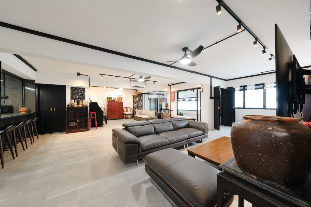 Industrial Living Room with Homogeneous Tiles and TV Console