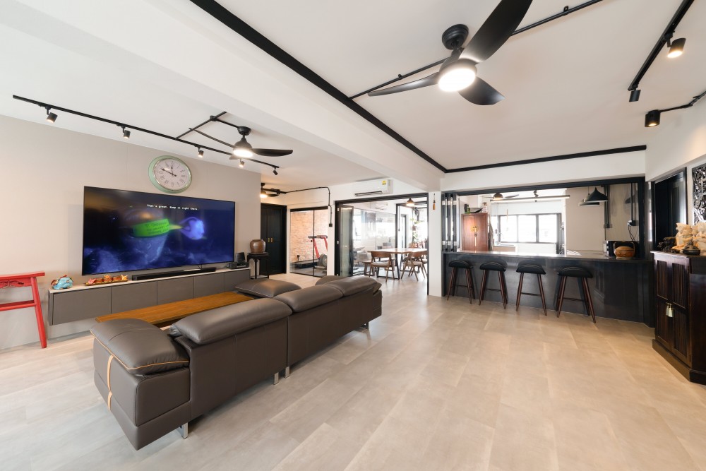 Industrial Living Room with Homogeneous Tiles and TV Console
