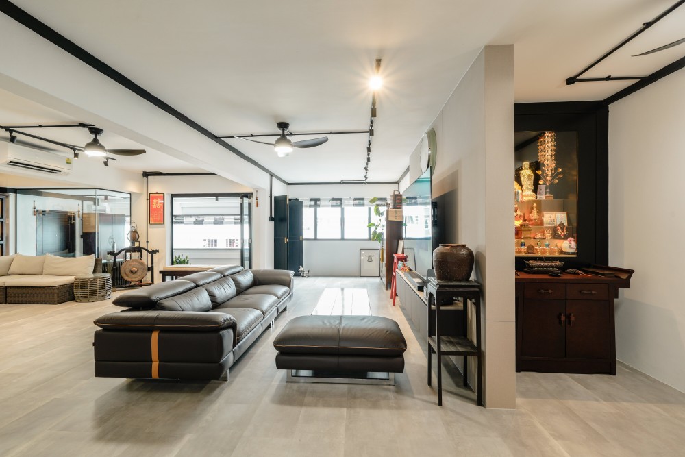 Industrial Living Room with Homogeneous Tiles and TV Console