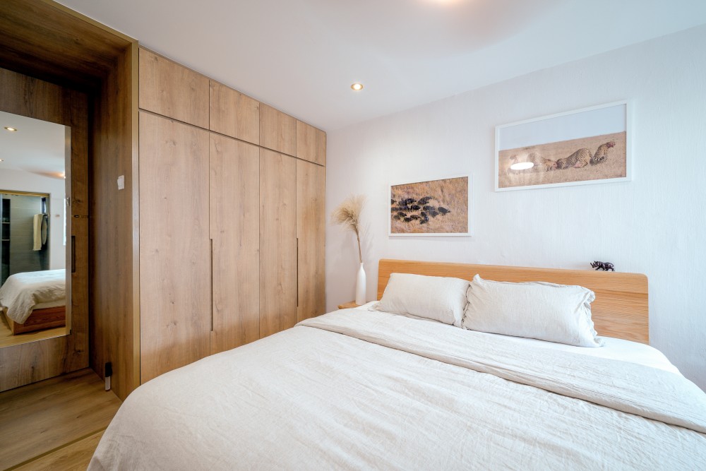 Scandinavian Bedroom with Vinyl Flooring and Built-in Bed