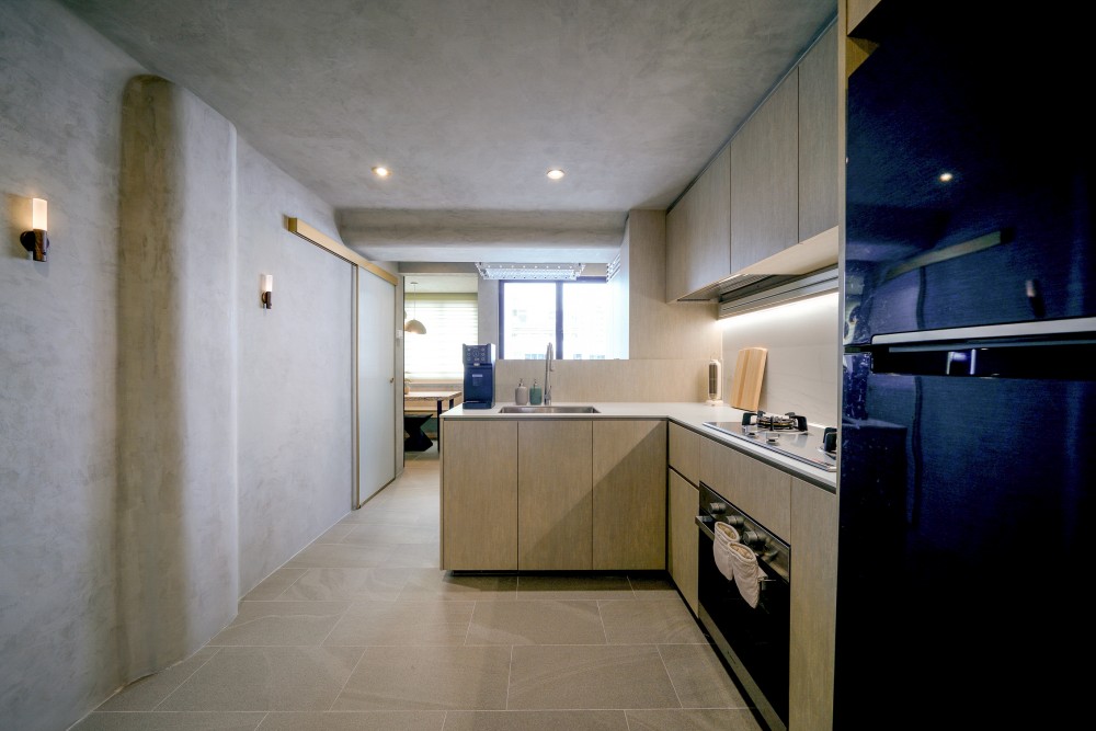 Scandinavian Kitchen with Homogeneous Tiles and Cupboard
