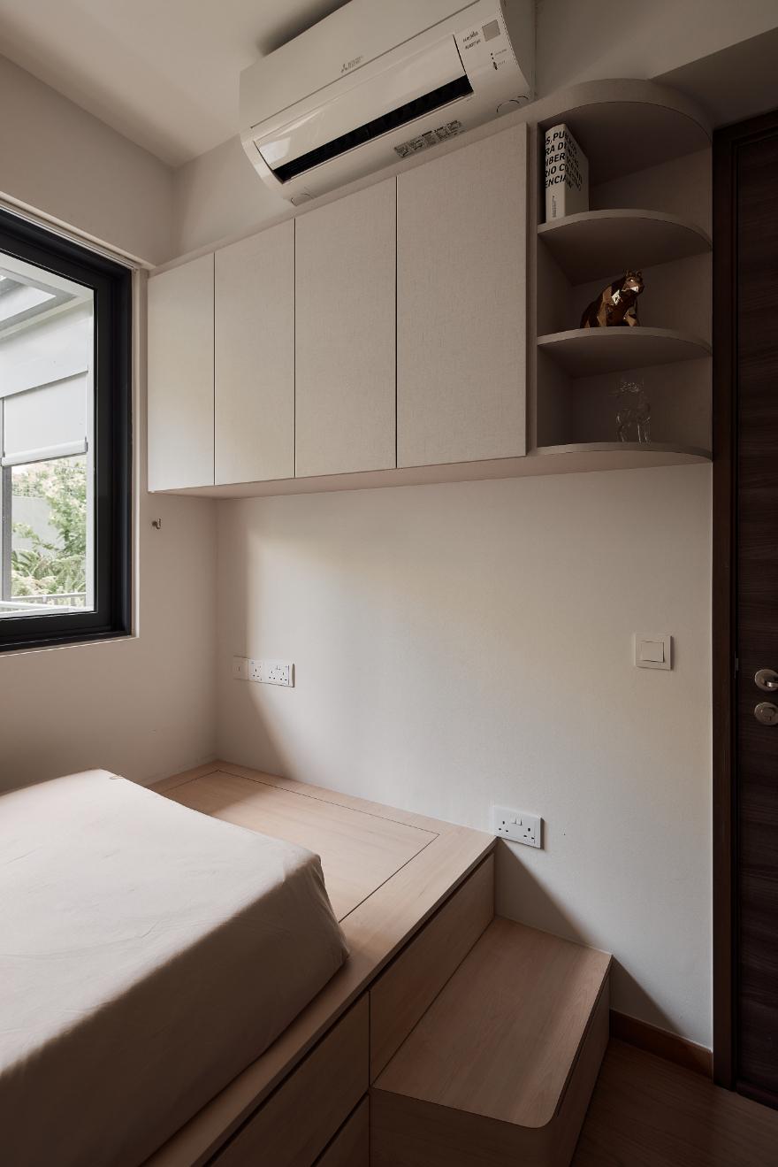 Asian Bedroom with Bookshelf and Platform Bed