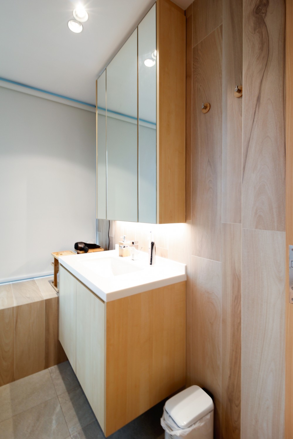 Asian Bathroom with Mirror and Bathroom Storage