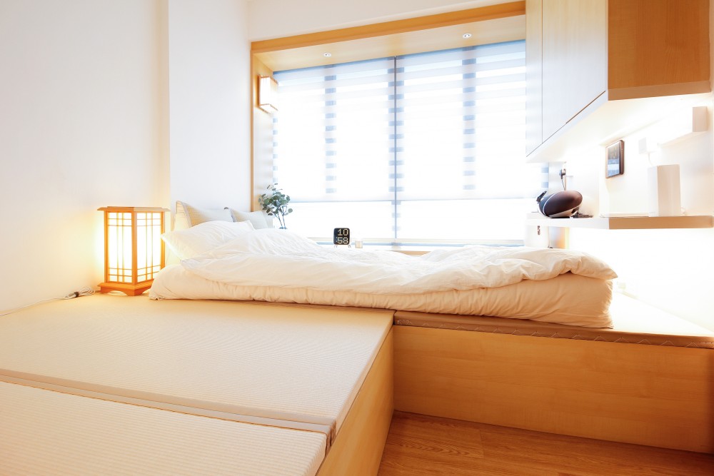 Asian Bedroom with Bookshelf and Platform Bed