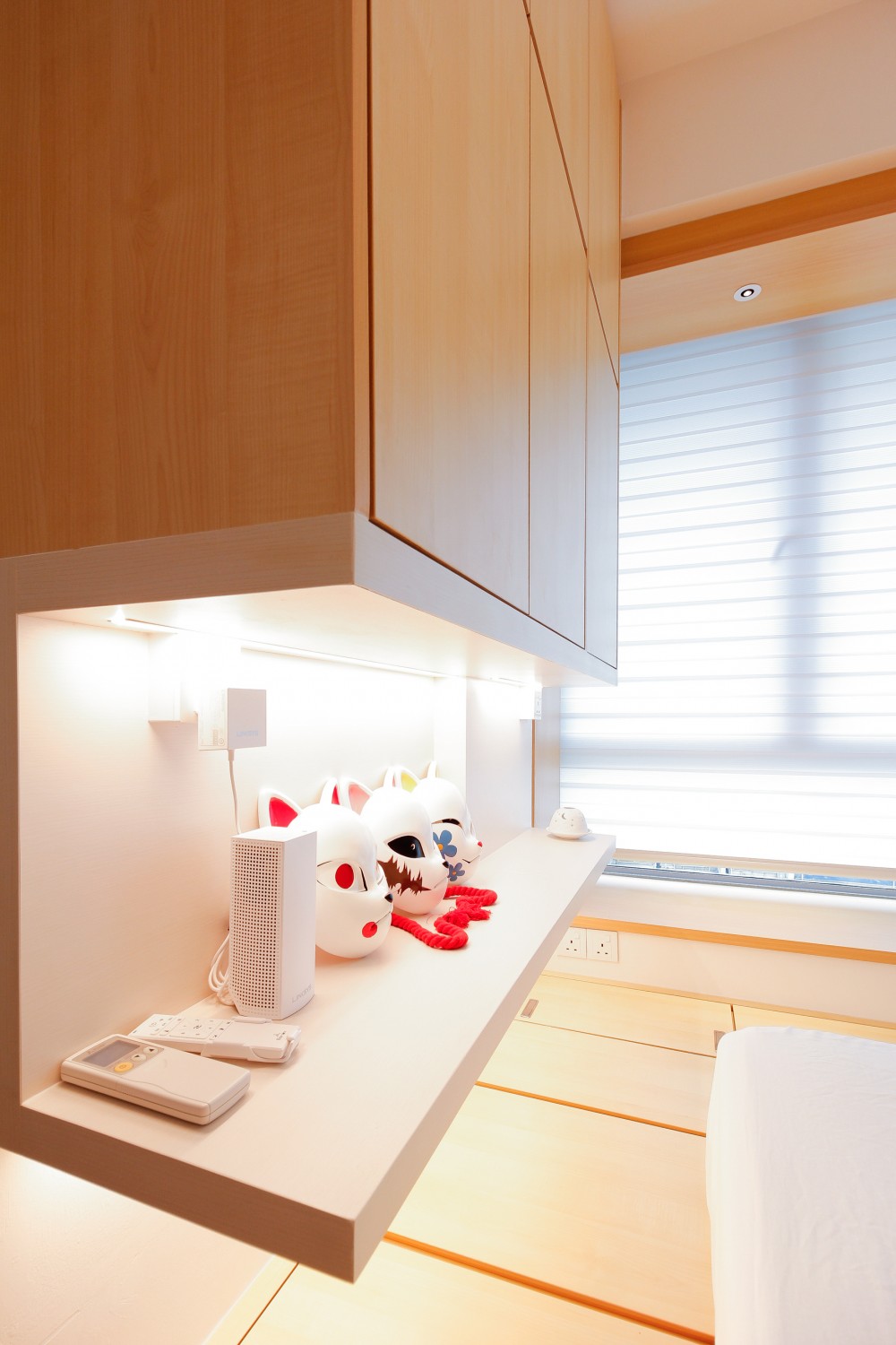 Asian Bedroom with Bookshelf and Platform Bed