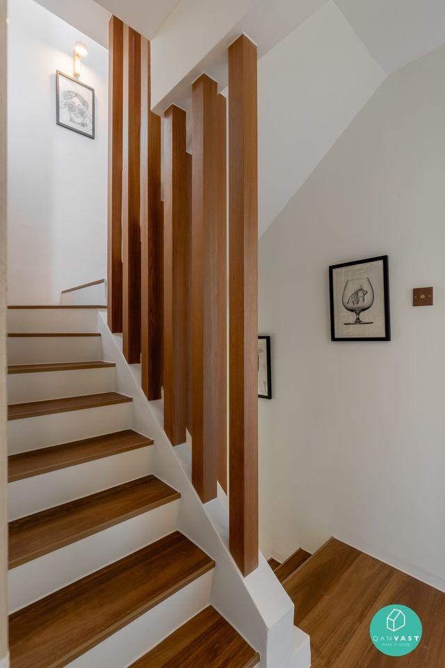 Transitional Foyer with Artwork and Planters