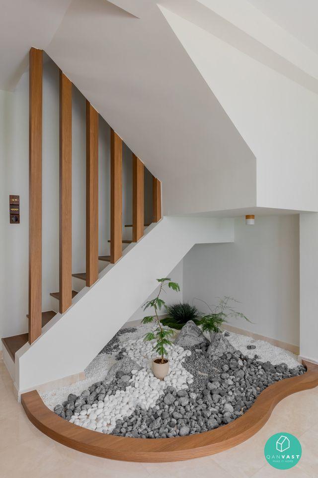 Transitional Foyer with Artwork and Planters