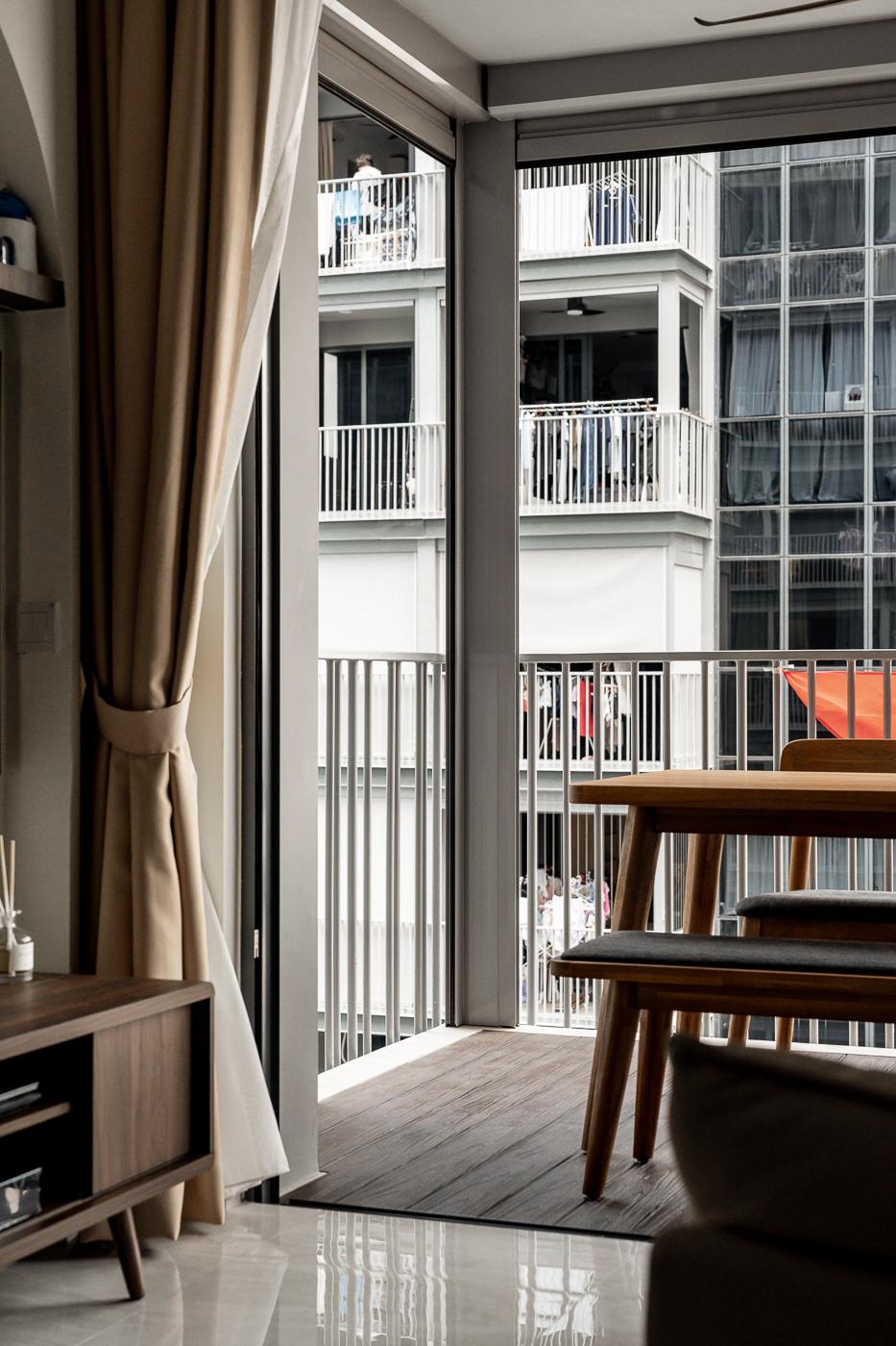 Modern Balcony with Window Shutters and Curtain
