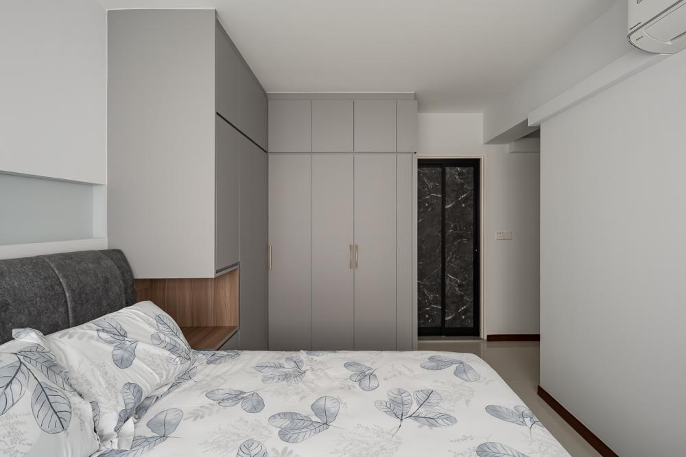 Modern Bedroom with Homogeneous Tiles and Wardrobe