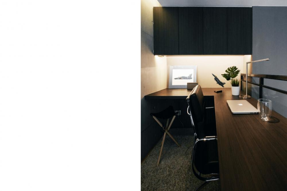 Industrial Home Office with Bookshelf and Desk Chairs