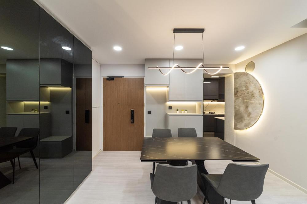 Modern Dining Room with Cove Lighting and Chandelier