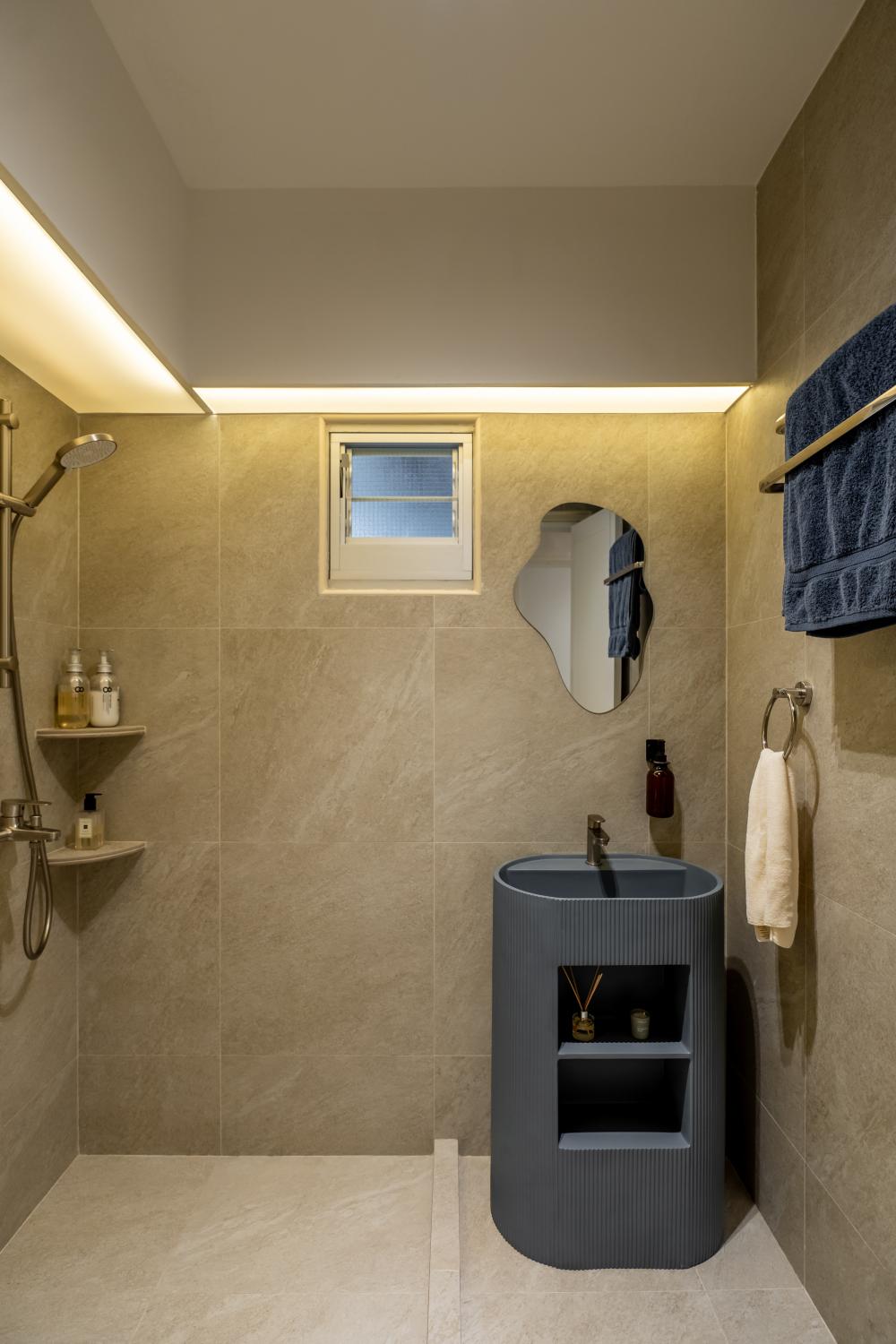 Scandinavian Bathroom with Homogeneous Tiles and Rainshower