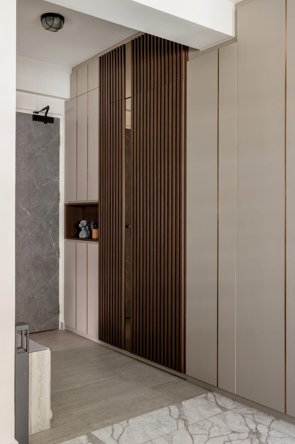 Contemporary Entryway with Shoe Cabinets and Doors