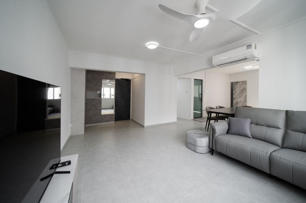 Modern Living Room with Homogeneous Tiles and Sofa