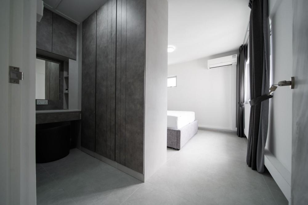 Modern Bedroom with Homogeneous Tiles and Wardrobe