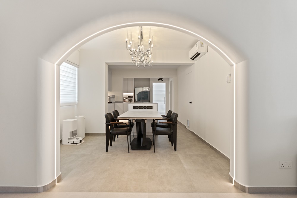 Minimalist Dining Room with Chandelier and Dining Table