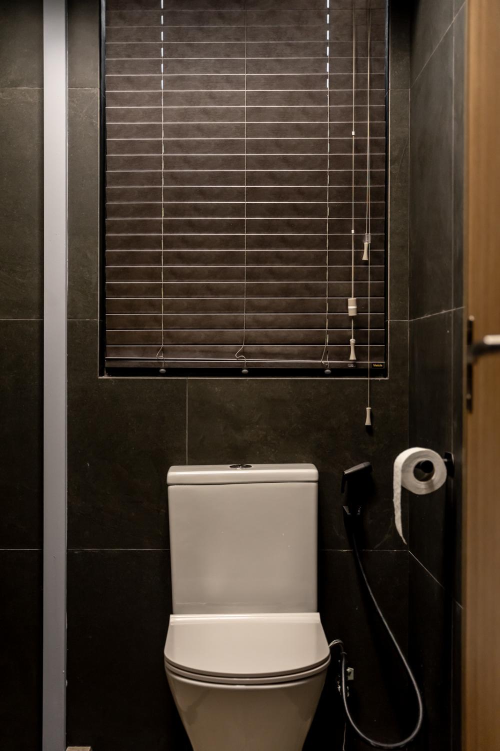 Industrial Bathroom with Homogeneous Tiles and Bathroom Accessories