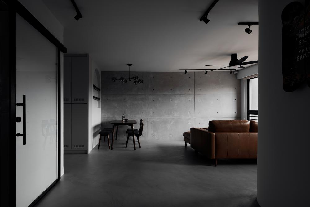 Industrial Living Room with Cement Floor and Sofa