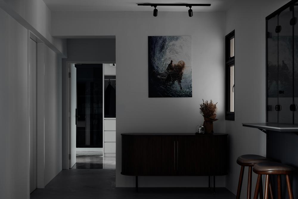 Industrial Living Room with Ceiling Light and Paintings