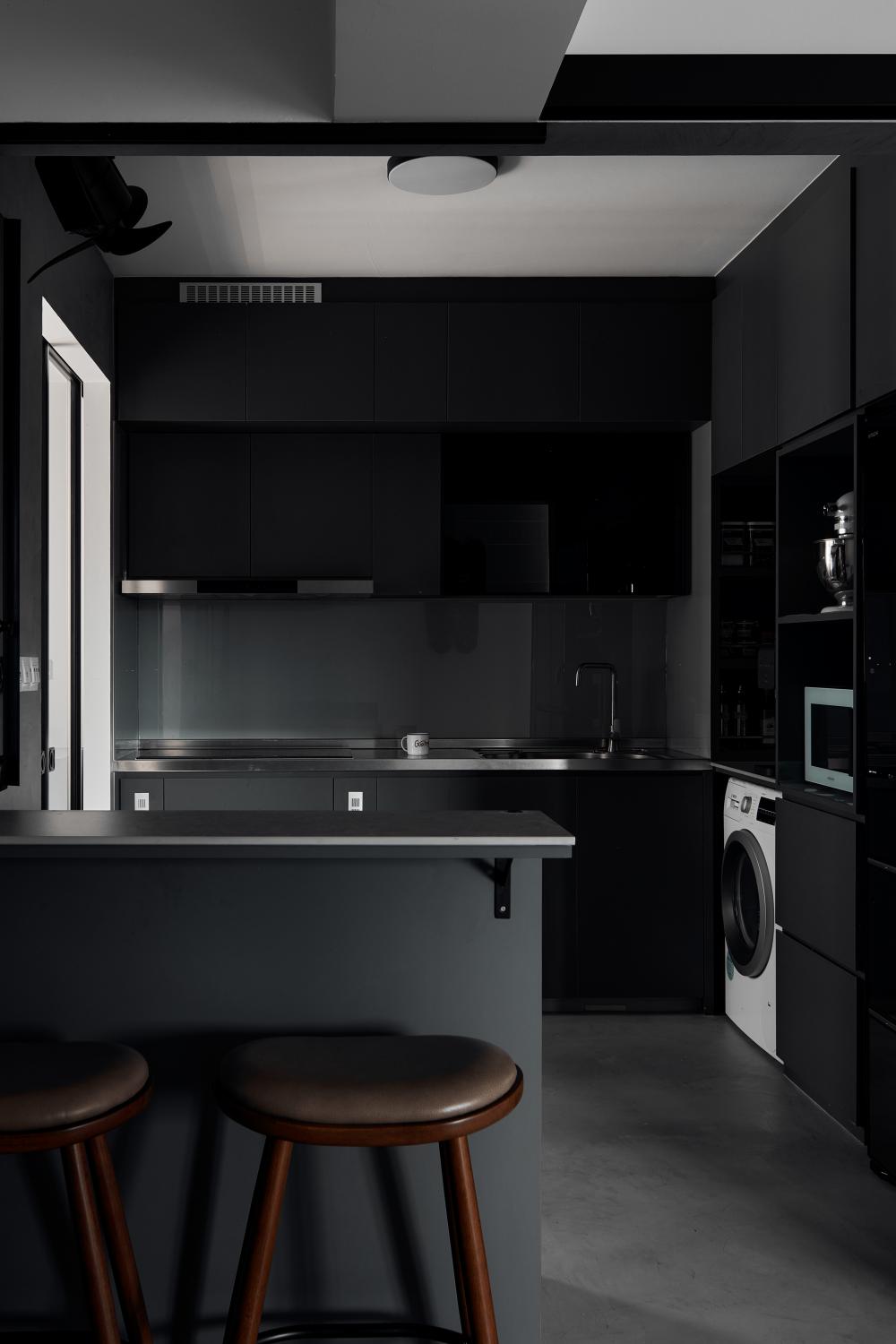 Industrial Kitchen with Countertop and Washing Machine